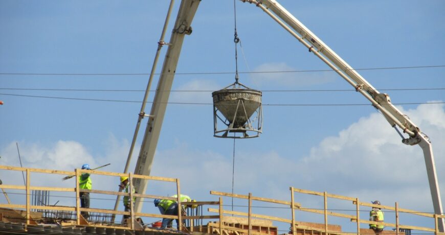 construction_site_cement_crane_pump_laborers_building_architecture-953215